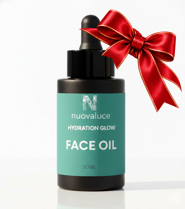 Hydration Glow Face Oil with red and gold holiday bow